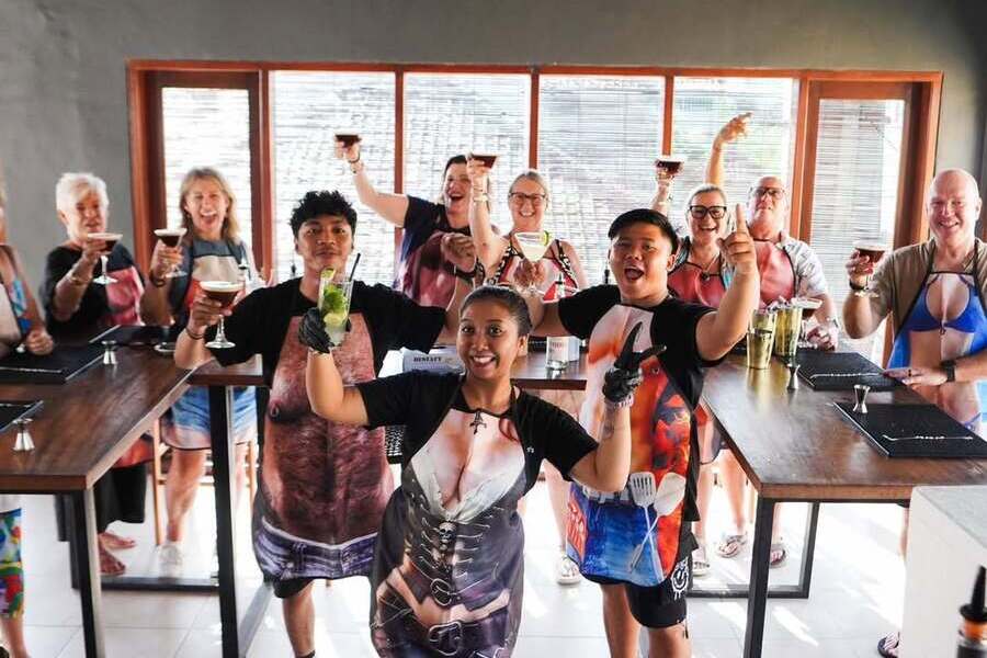 People holding drinks at Frankie’s Bar cocktail class